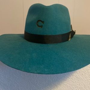 Gently used - only worn a few times. Size small Charlie 1 Horse hat. Turquoise.